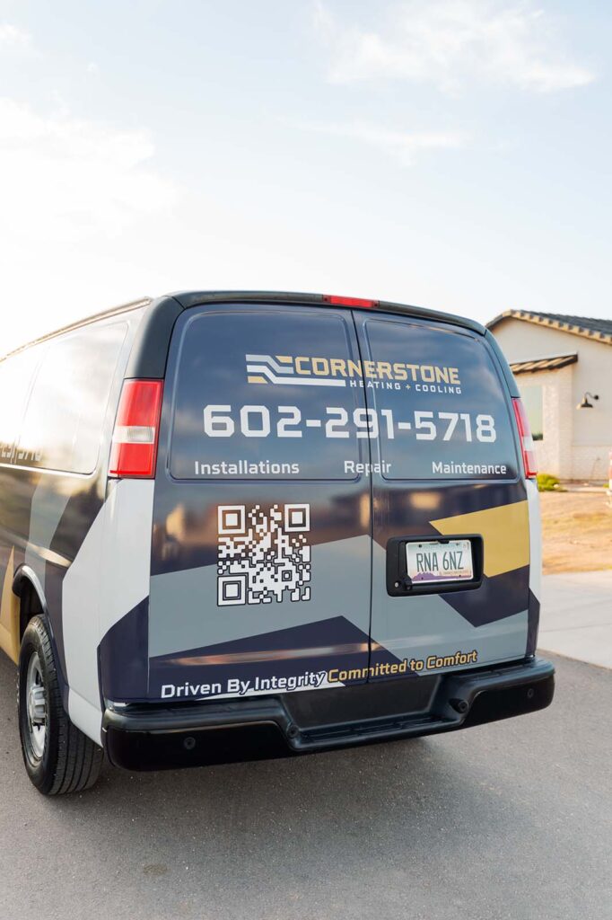 Cornerstone Heating and Cooling's work van, driving through a North Scottsdale neighborhood.
