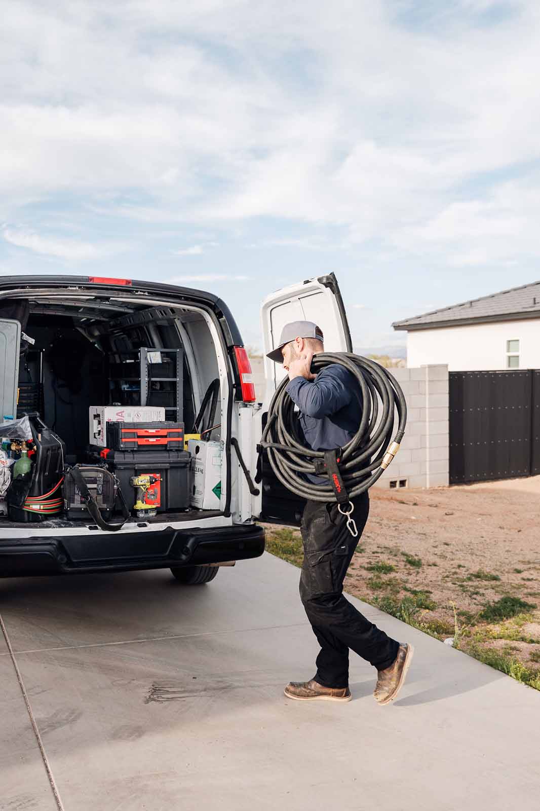John Baca working out of the Cornerstone Heating and Cooling work van.